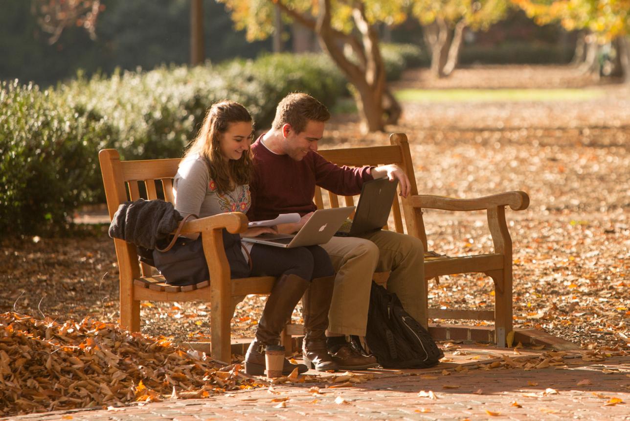 William & Mary students on Old Campus in the fall